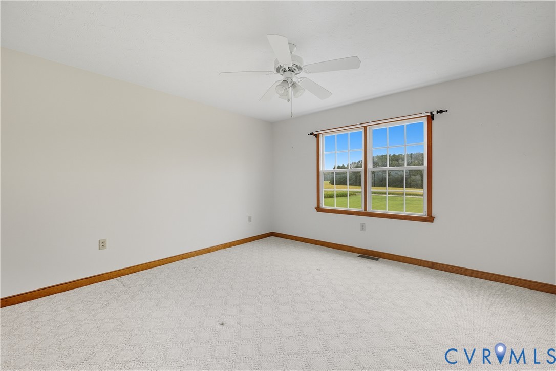 22419 Shippings Road McKenney, VA 23872 - Photo 16 of 35 an empty room with a window