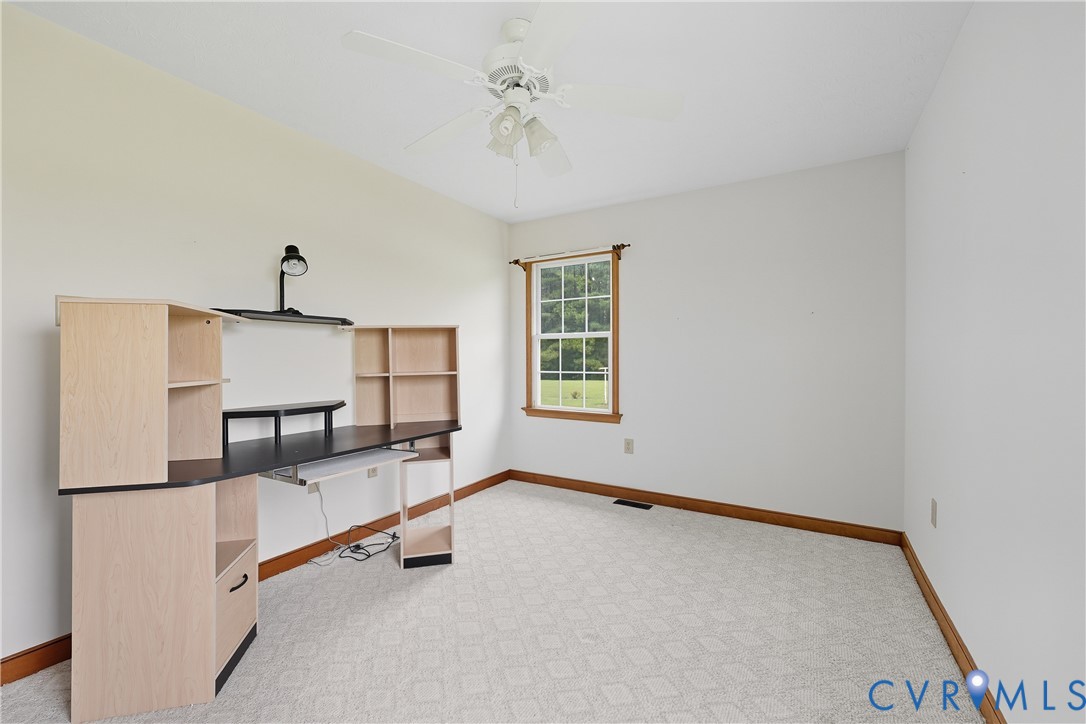 22419 Shippings Road McKenney, VA 23872 - Photo 18 of 35 a view of a room with gym equipment and windows