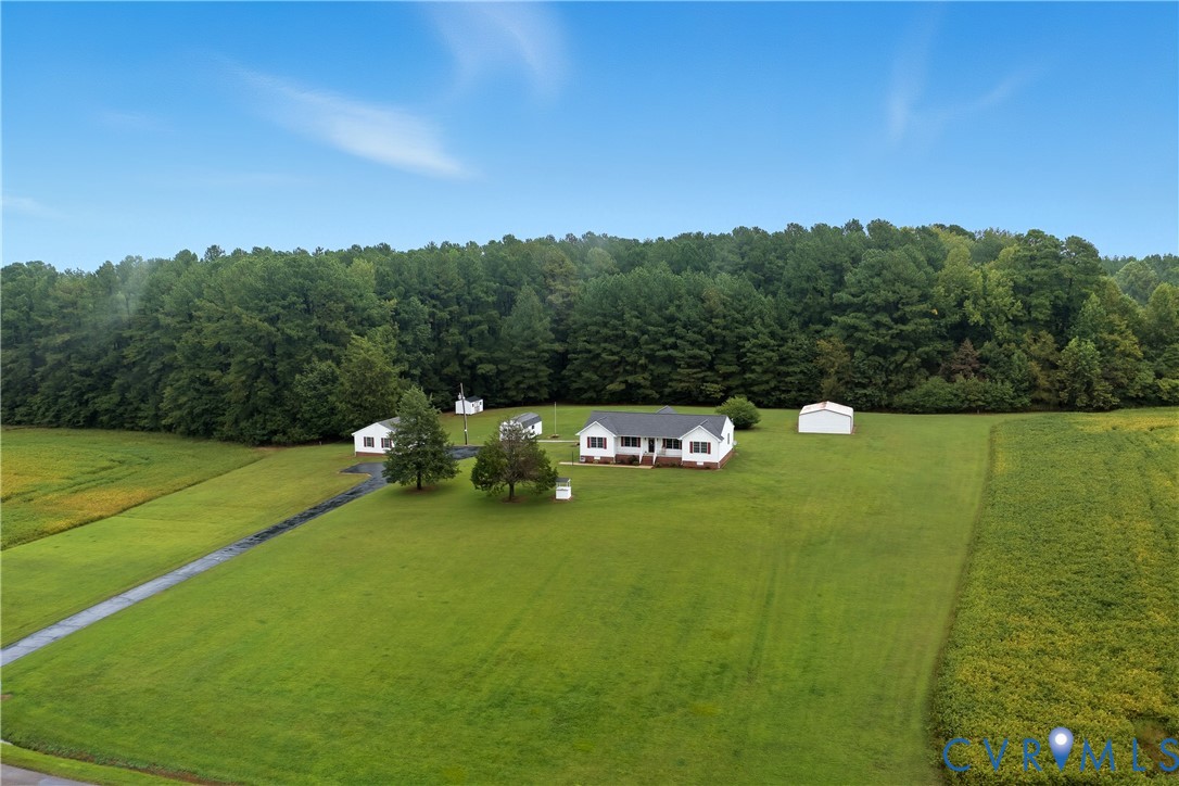 22419 Shippings Road McKenney, VA 23872 - Photo 2 of 35 a backyard of a house with lots of green space