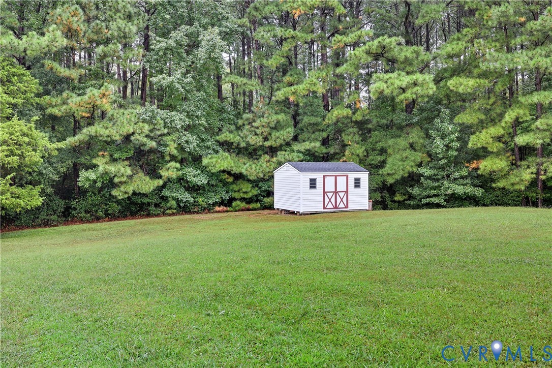 22419 Shippings Road McKenney, VA 23872 - Photo 28 of 35 a sign board with tall trees