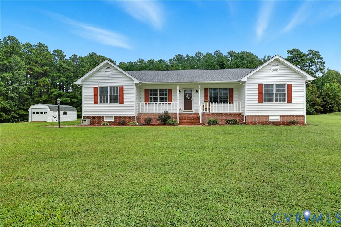 22419 Shippings Road McKenney, VA 23872 - Photo 3 of 35 a front view of a house with a yard