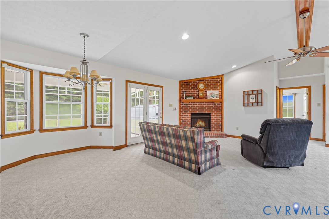 22419 Shippings Road McKenney, VA 23872 - Photo 9 of 35 a living room with furniture and a fireplace