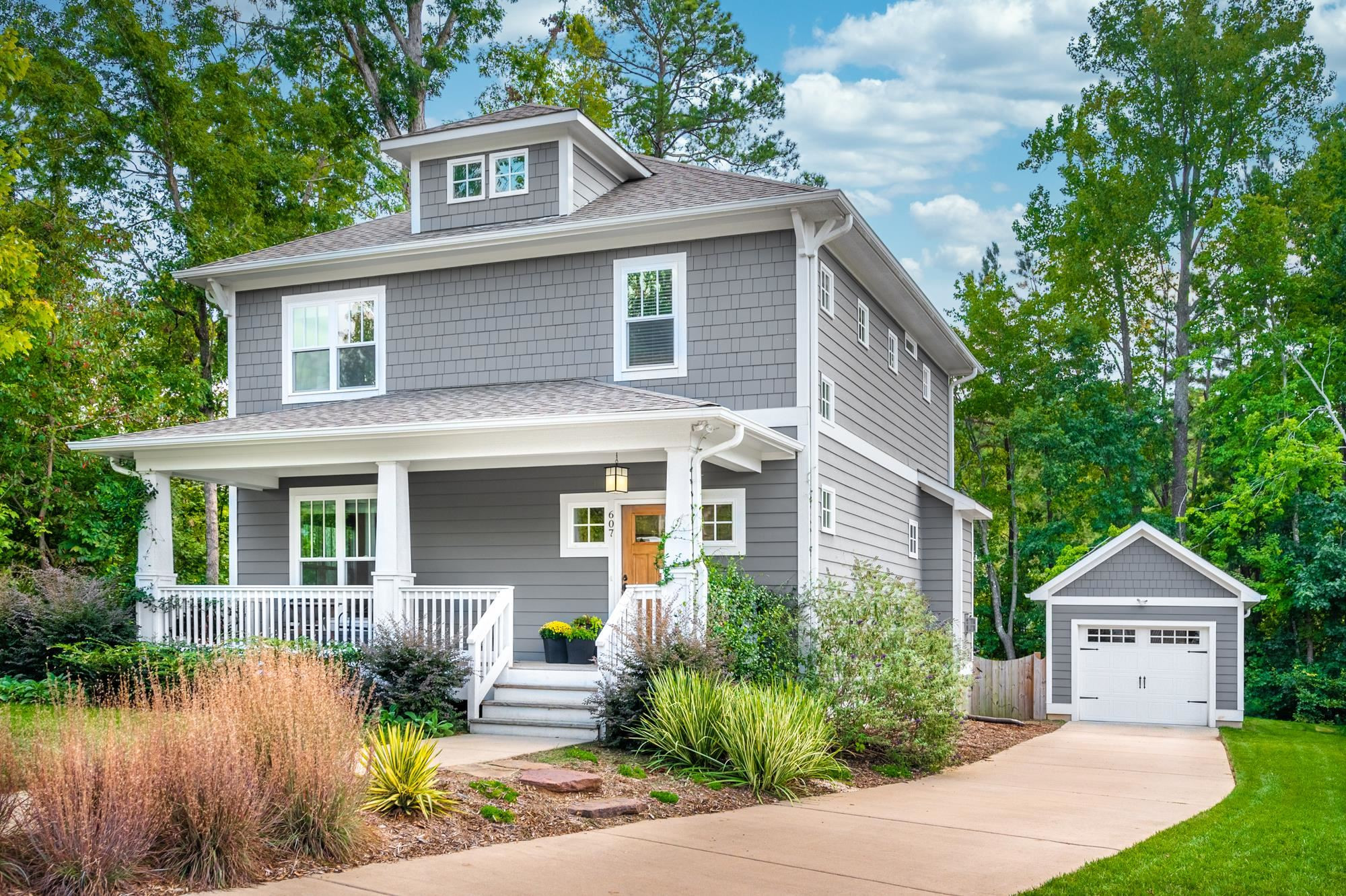 607 Jerome Road Durham, NC 27713 - Photo 2 of 30 Be welcomed by the professionally landscaped walkway+beds and substantial covered front porch with tapered columns.
