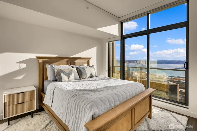 a kitchen with granite countertop stainless steel appliances and wooden cabinets