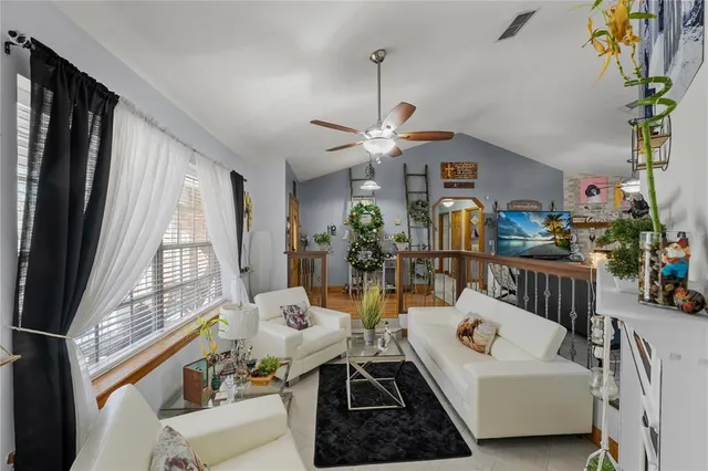 a view of walk in closet with clothes