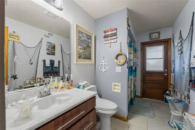 a kitchen with cabinets and appliances