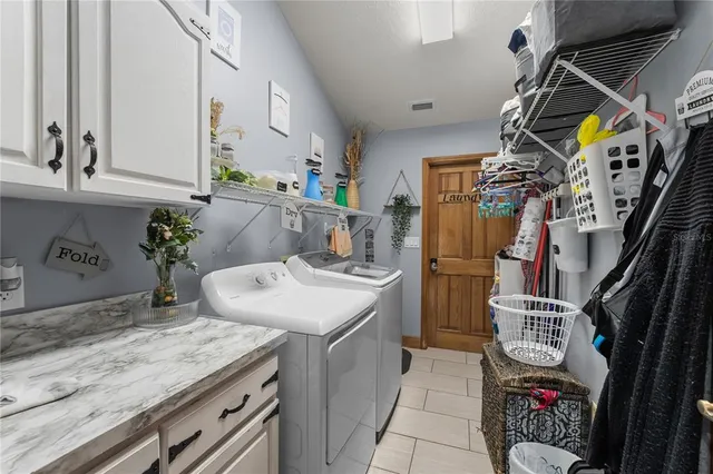 a view of a backyard with sitting area