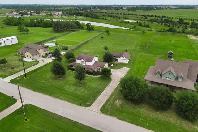 a view of a table and chairs in the garden