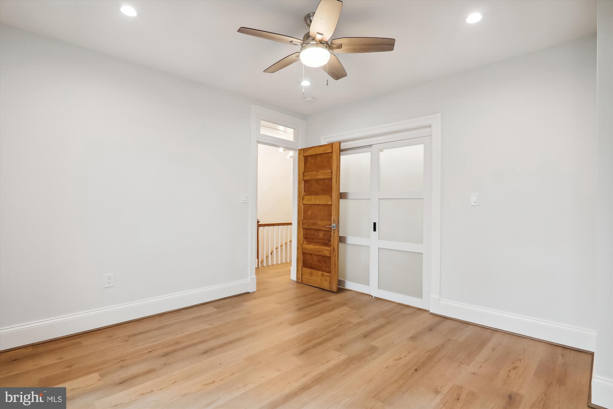 721 Quebec Place Northwest Washington, DC 20010 - Photo 42 of 77 wooden floor in an empty room