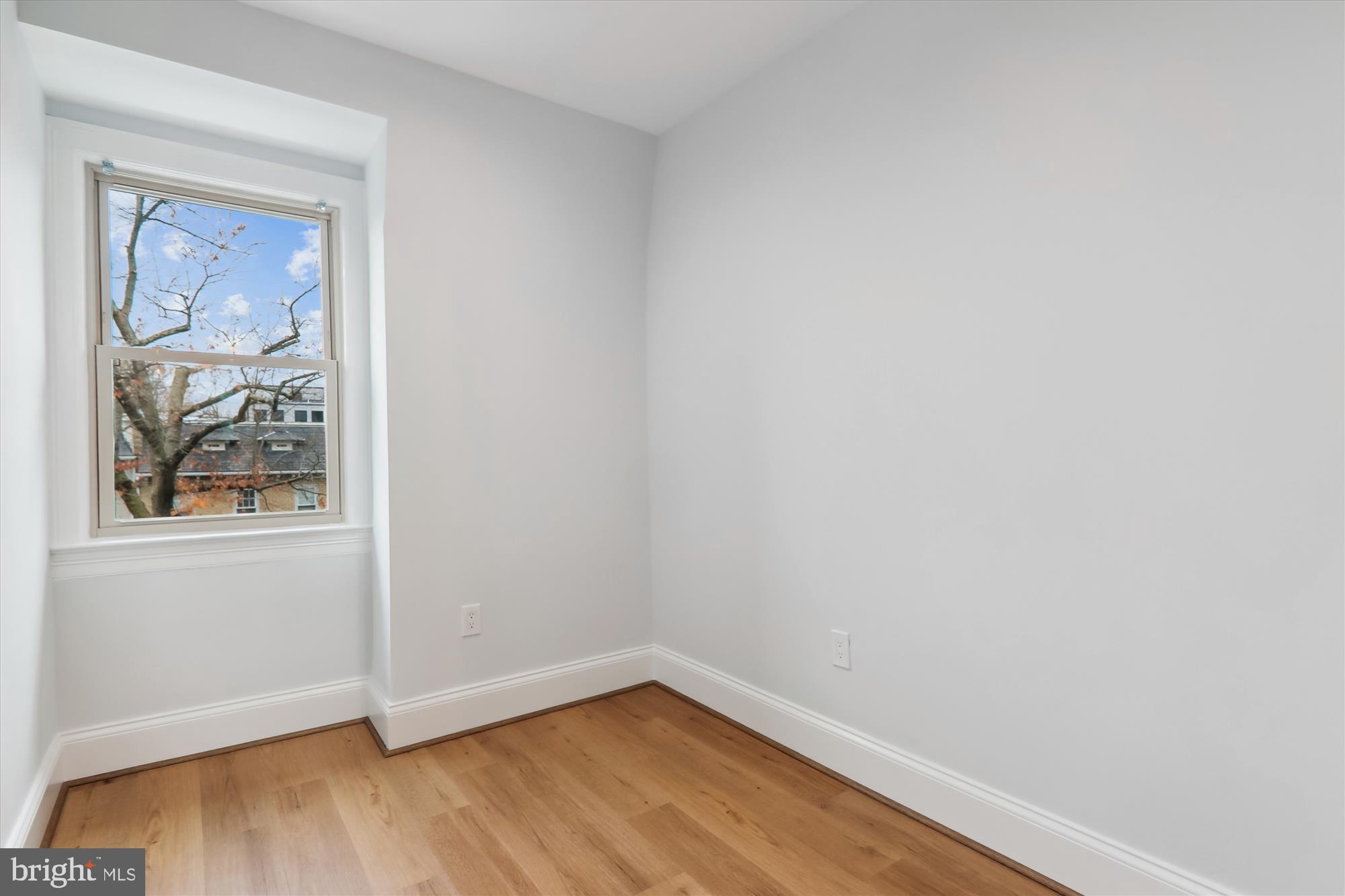 721 Quebec Place Northwest Washington, DC 20010 - Photo 43 of 77 a view of a small space with wooden floor and a window