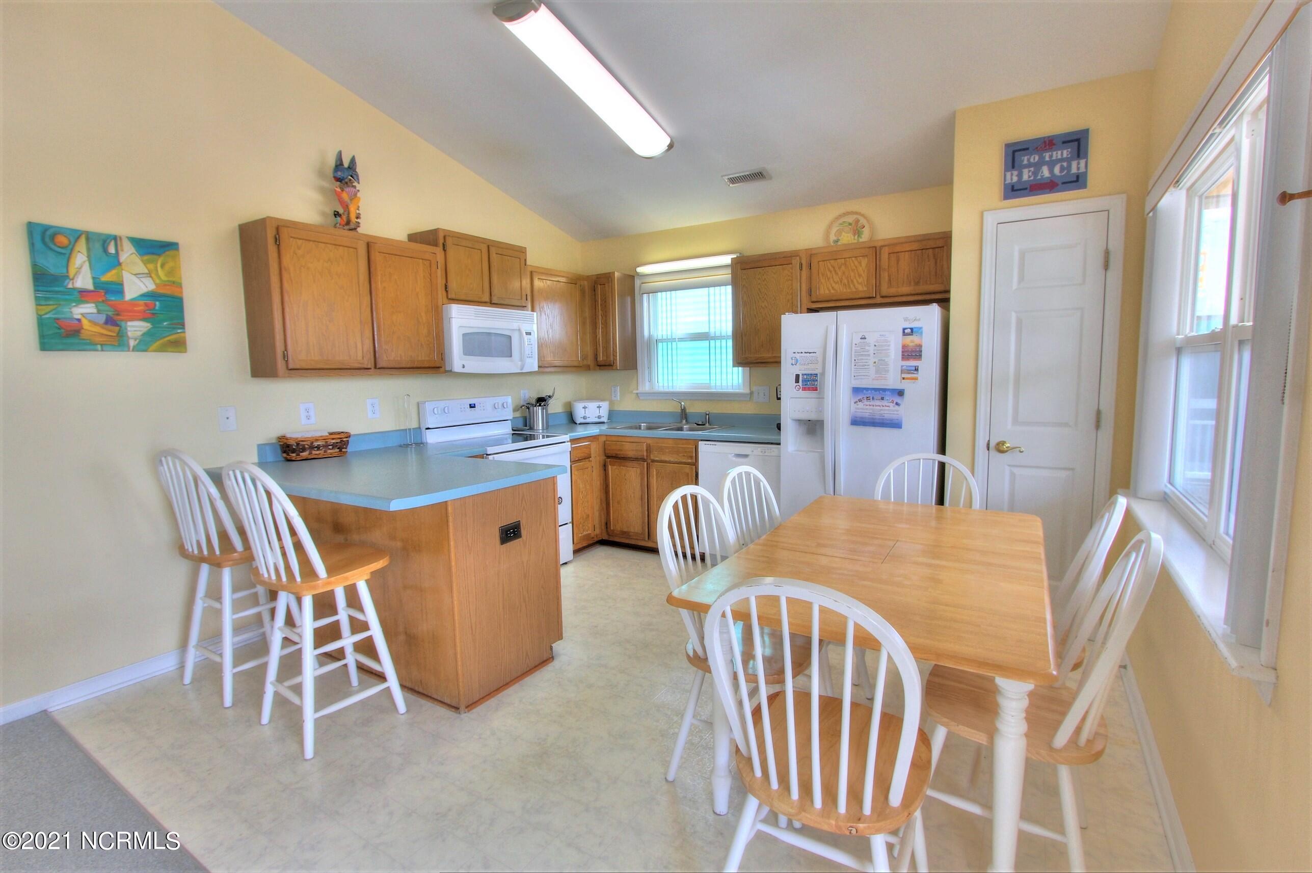 155 Topsail Road North Topsail Beach, NC 28460 - Photo 8 of 22 Kitchen with Breakfast Bar