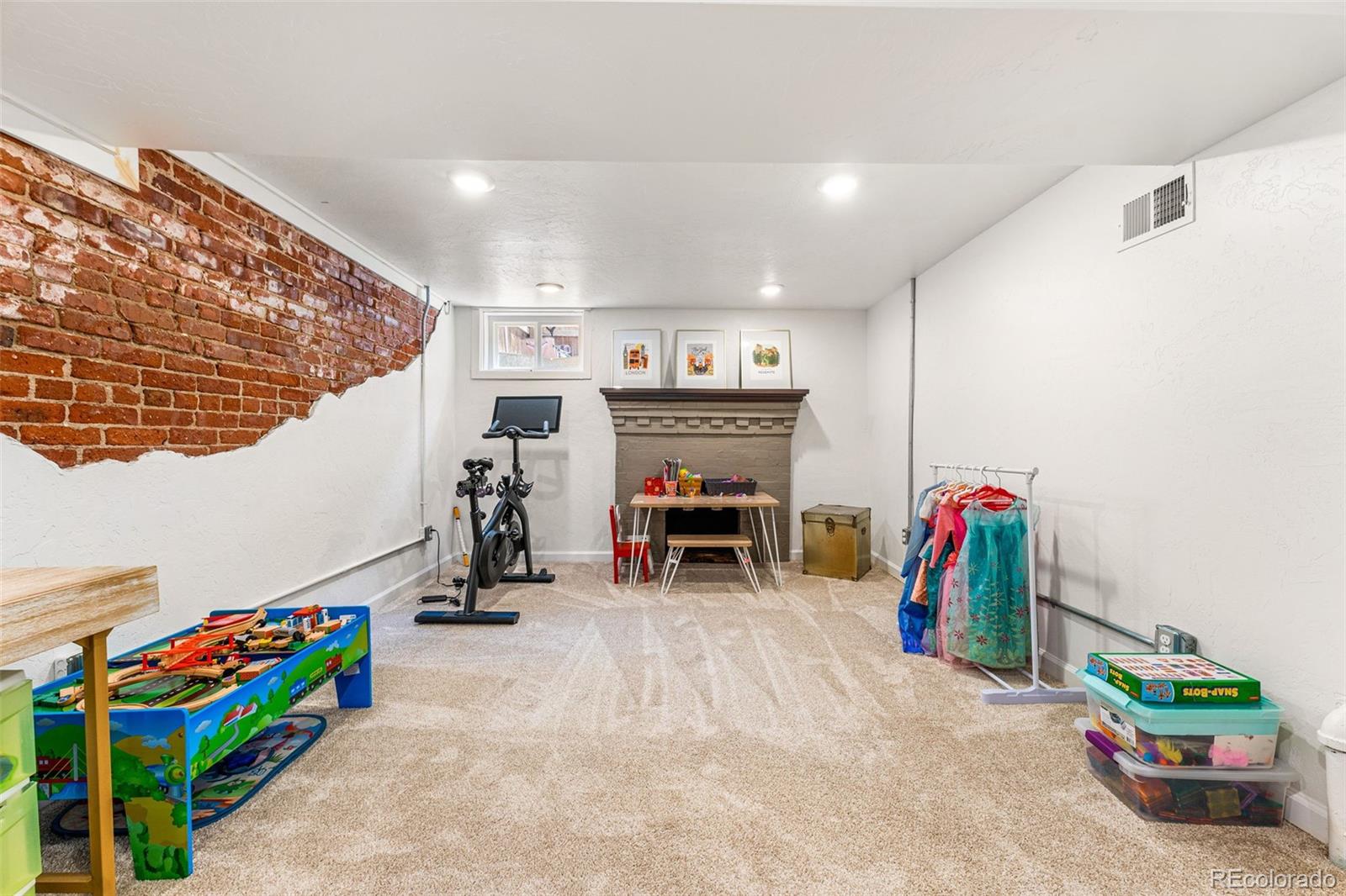 4425 Alcott Street Denver, CO 80211 - Photo 32 of 40 a view of play room with gym equipment