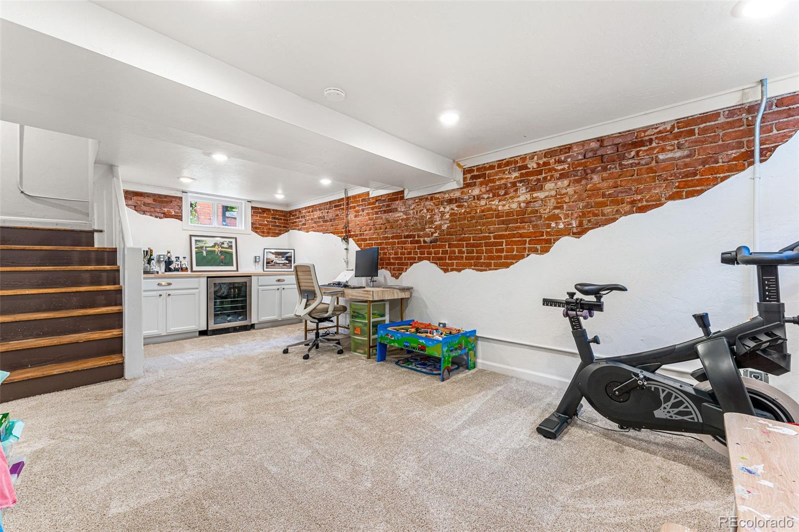 4425 Alcott Street Denver, CO 80211 - Photo 33 of 40 a room with furniture and white walls