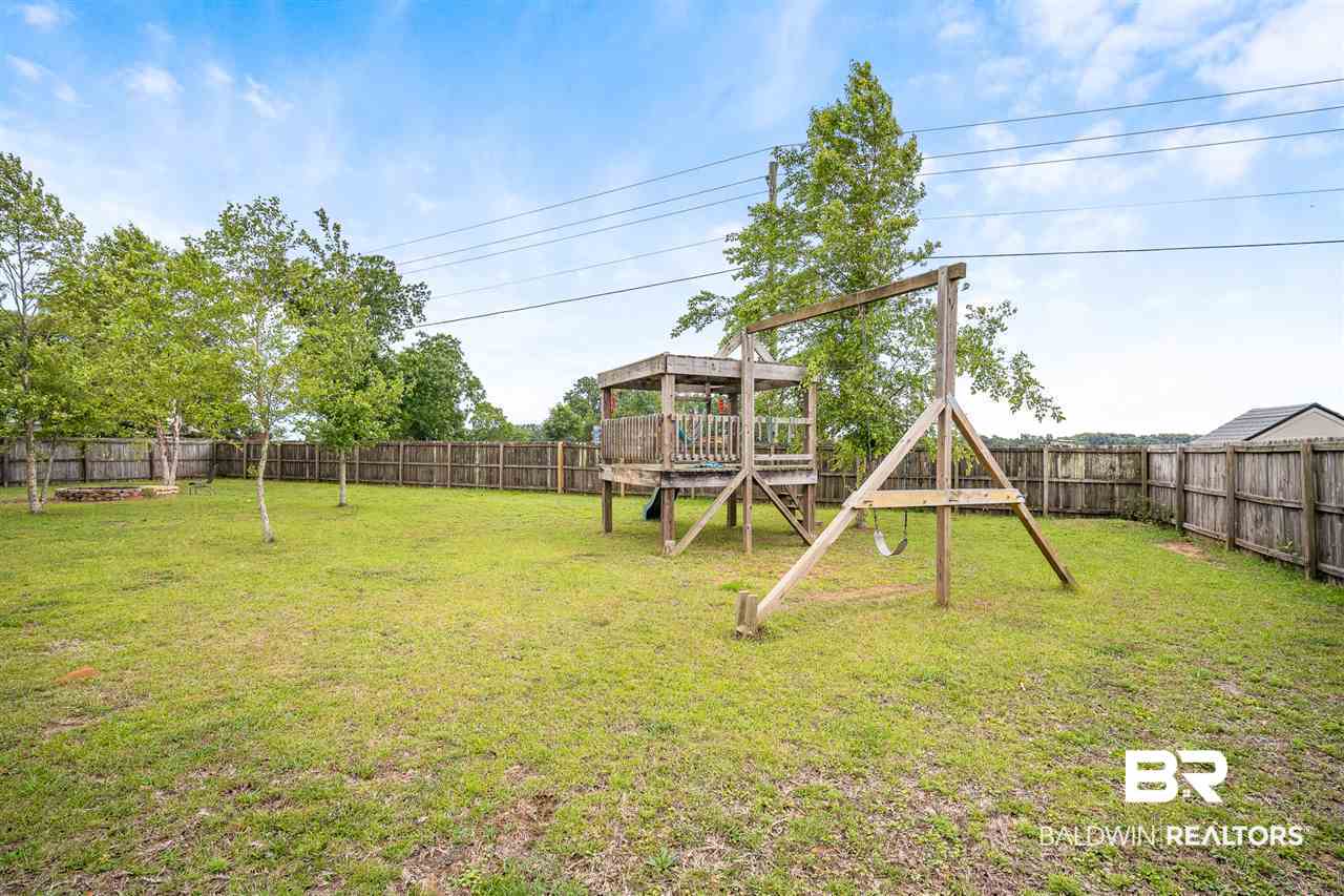 10921 Roanoke Loop Daphne, AL 36526 - Photo 25 of 31 Play set in Backyard
