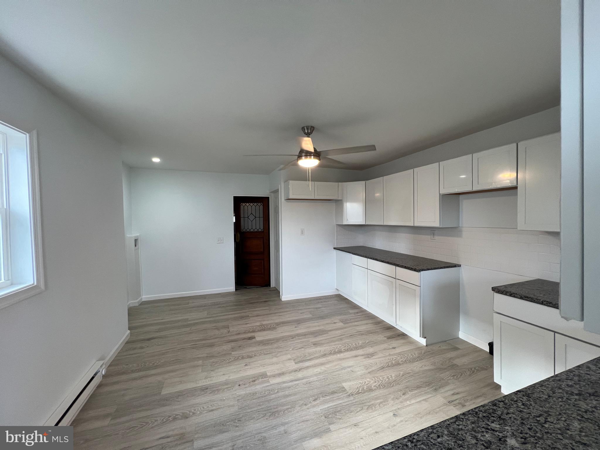 405 North Front Street Minersville, PA 17954 - Photo 11 of 32 a large kitchen with kitchen island a sink stainless steel appliances and cabinets