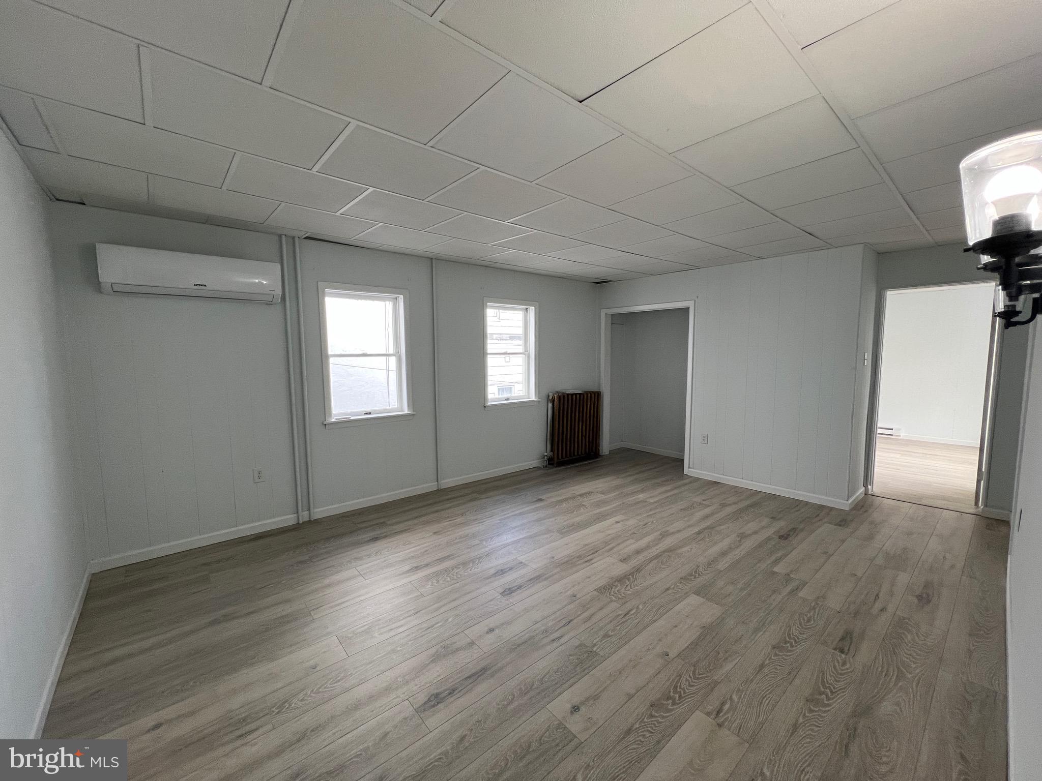 405 North Front Street Minersville, PA 17954 - Photo 21 of 32 a view of empty room with wooden floor and fan