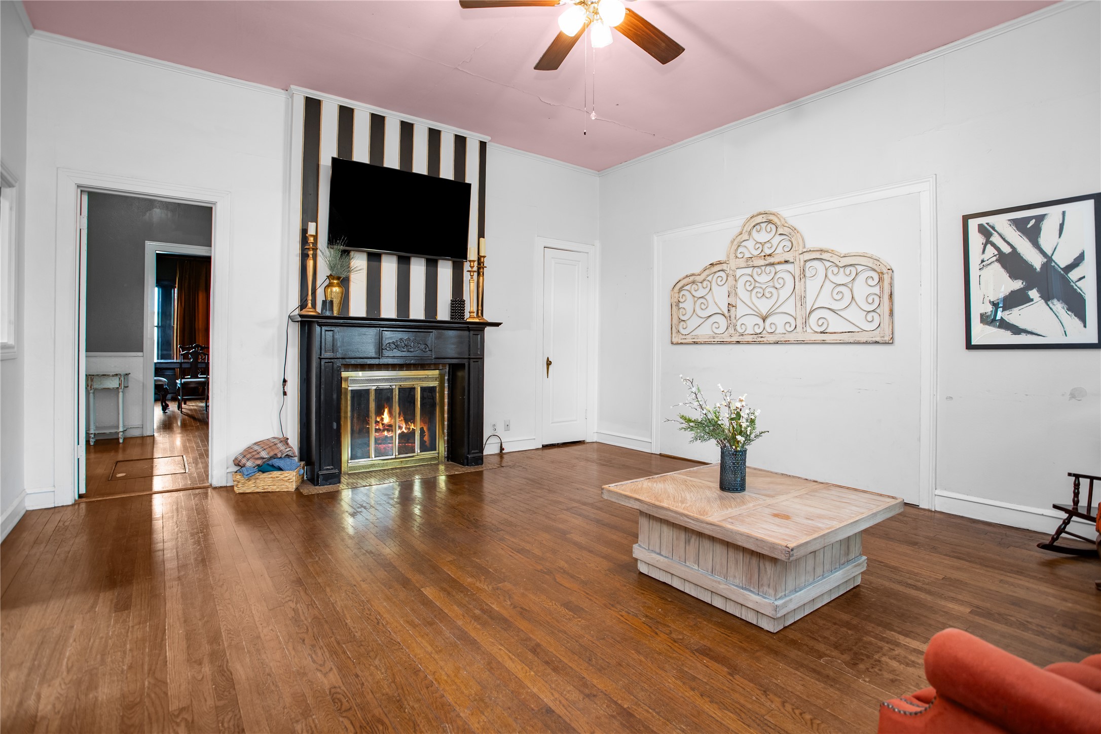 706 East Main Street Madisonville, TX 77864 - Photo 13 of 25 a view of living room with furniture and a flat screen tv