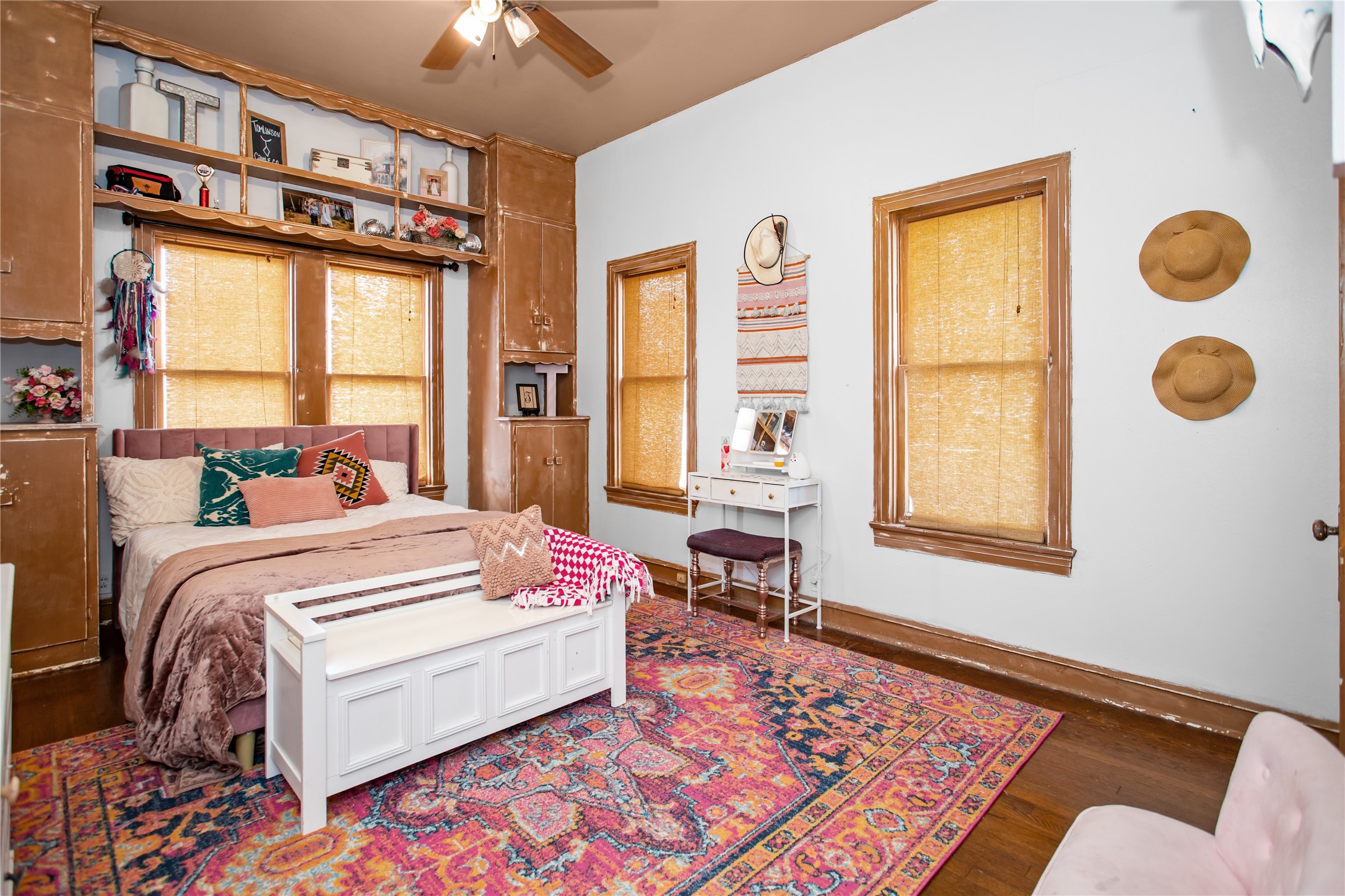 706 East Main Street Madisonville, TX 77864 - Photo 16 of 25 a bedroom with a bed and wooden floor