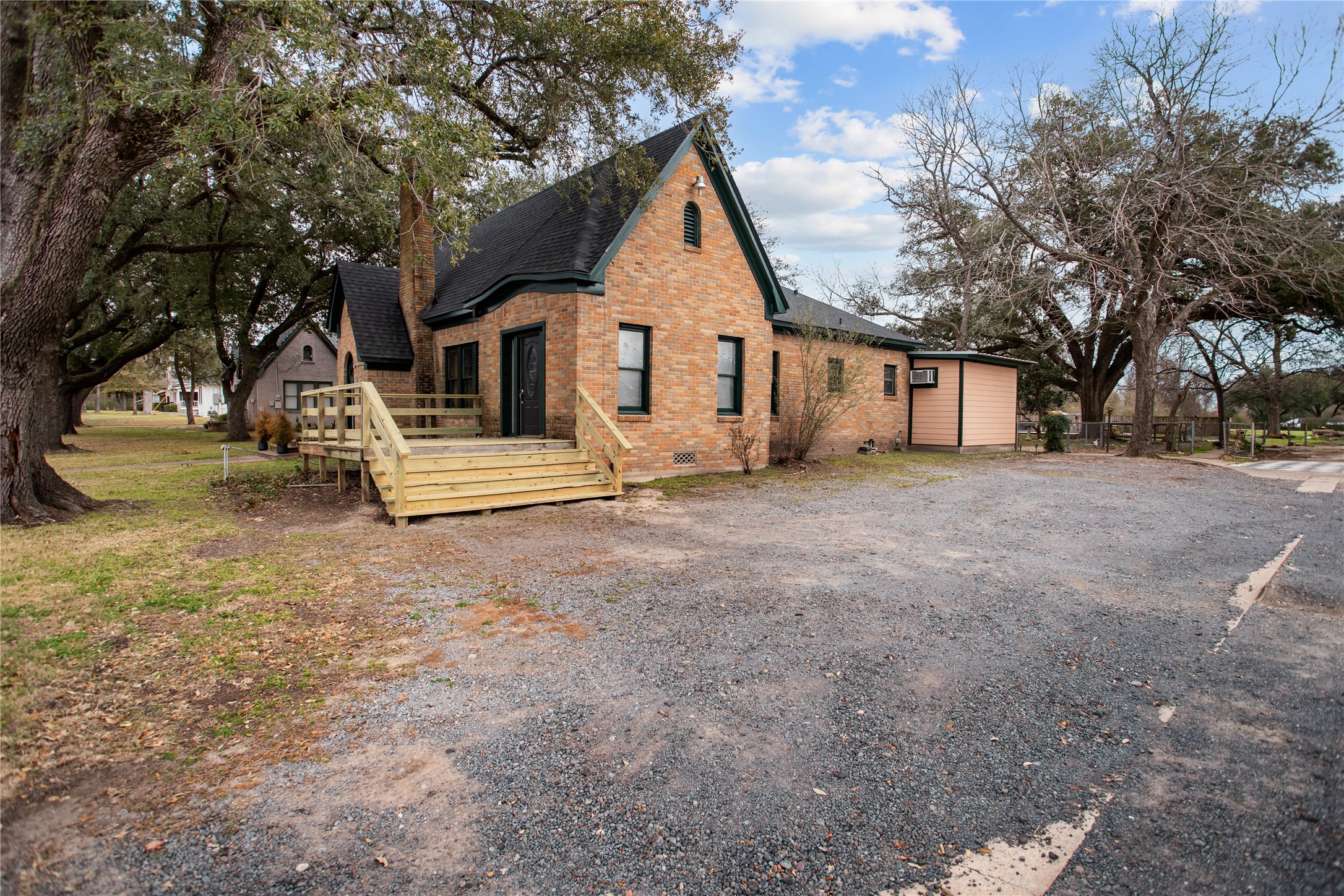 706 East Main Street Madisonville, TX 77864 - Photo 2 of 25 a view of house with a yard
