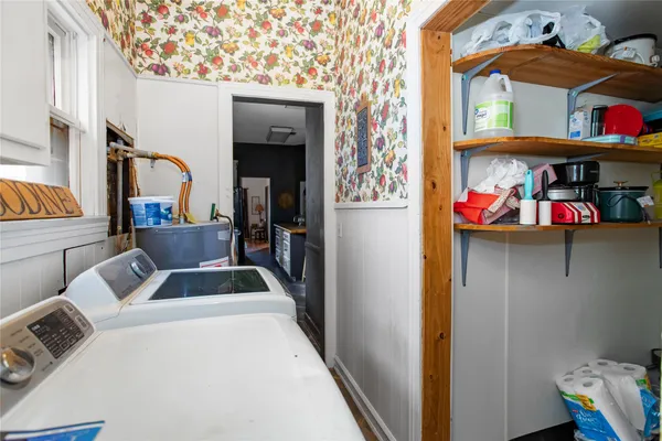 a utility room with dryer and washer