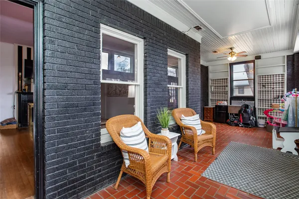 a patio with table and chairs