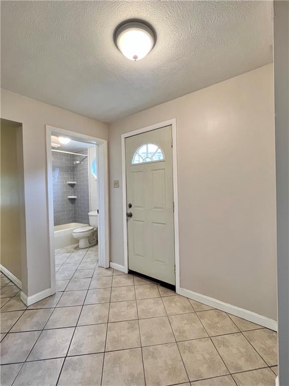 124 Virginia Avenue, Unit 2 Mount Washington, PA 15211 - Photo 3 of 11 a view of a hallway with wooden floor and a bathroom