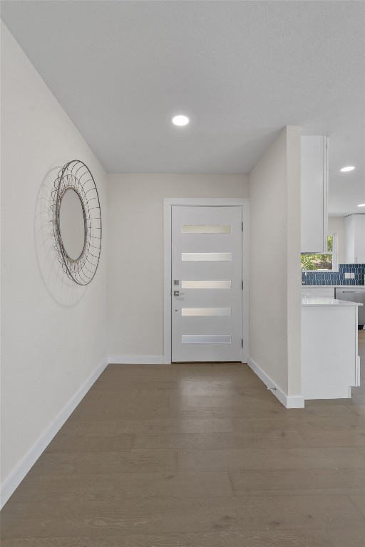 6901 Windrift Way Austin, TX 78745 - Photo 16 of 30 Foyer entrance featuring recessed lighting and light wood finished floors