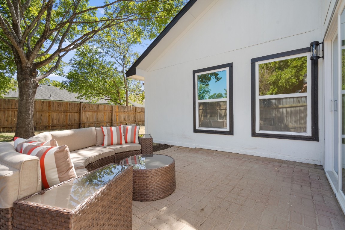 6901 Windrift Way Austin, TX 78745 - Photo 26 of 30 View of patio with an outdoor living space