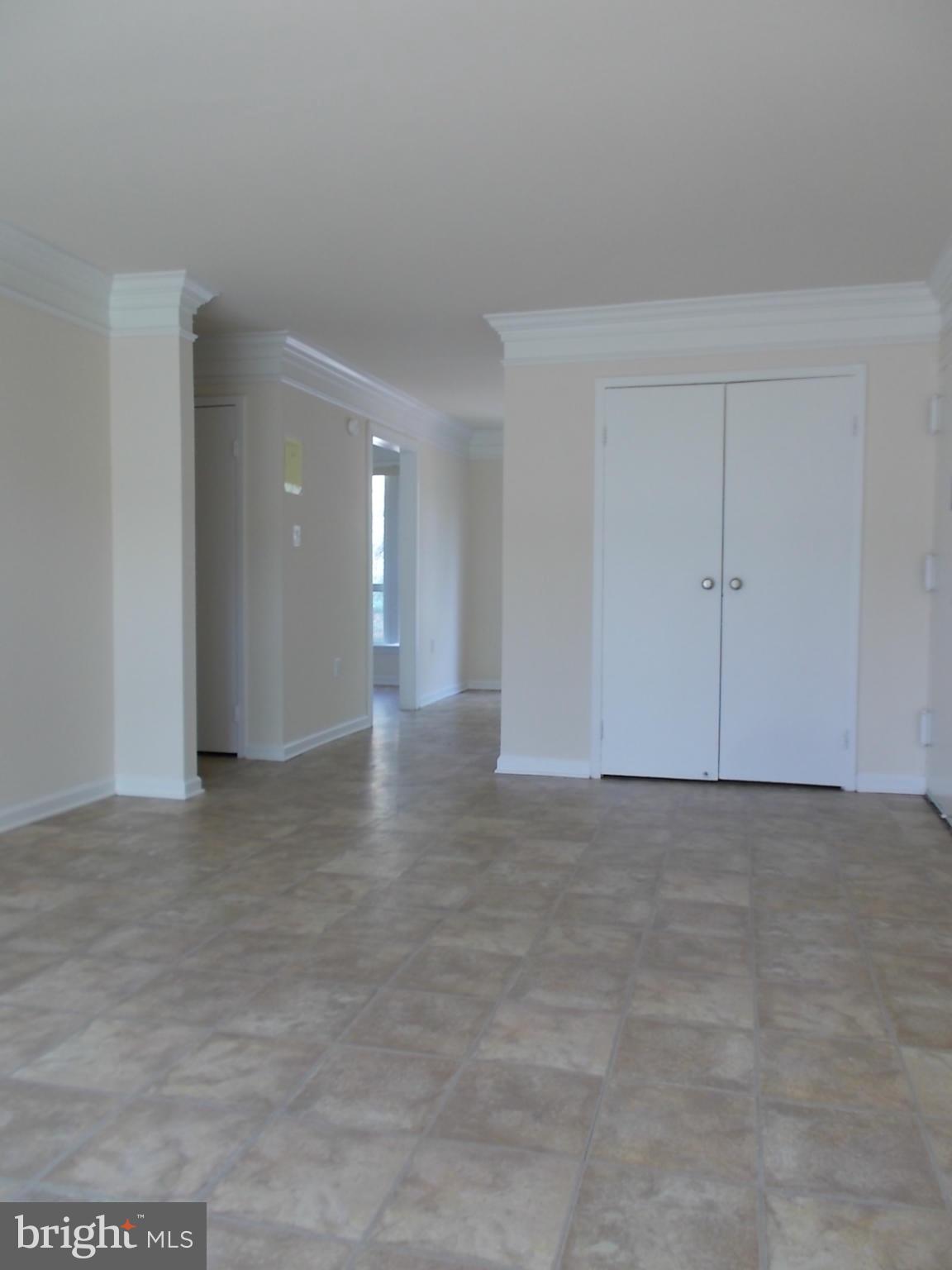 3934 Bel Pre Road, Unit 6 Silver Spring, MD 20906 - Photo 3 of 16 a view of an empty room and window
