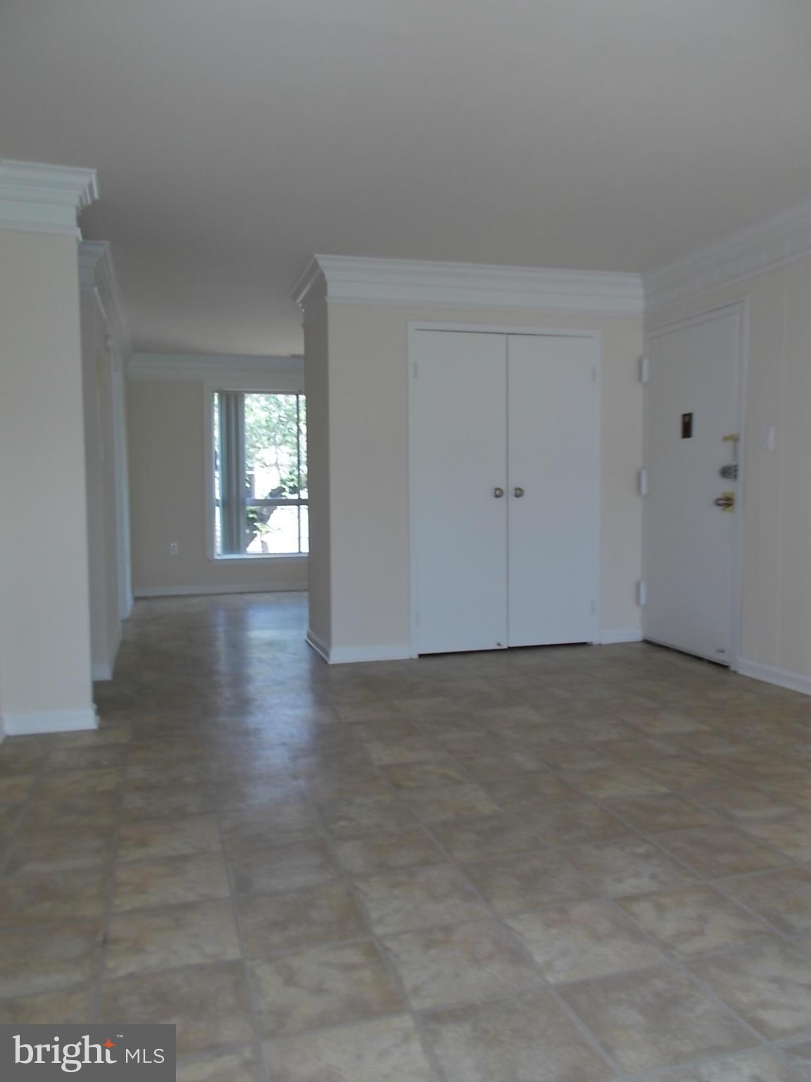 3934 Bel Pre Road, Unit 6 Silver Spring, MD 20906 - Photo 4 of 16 a view of an empty room and window