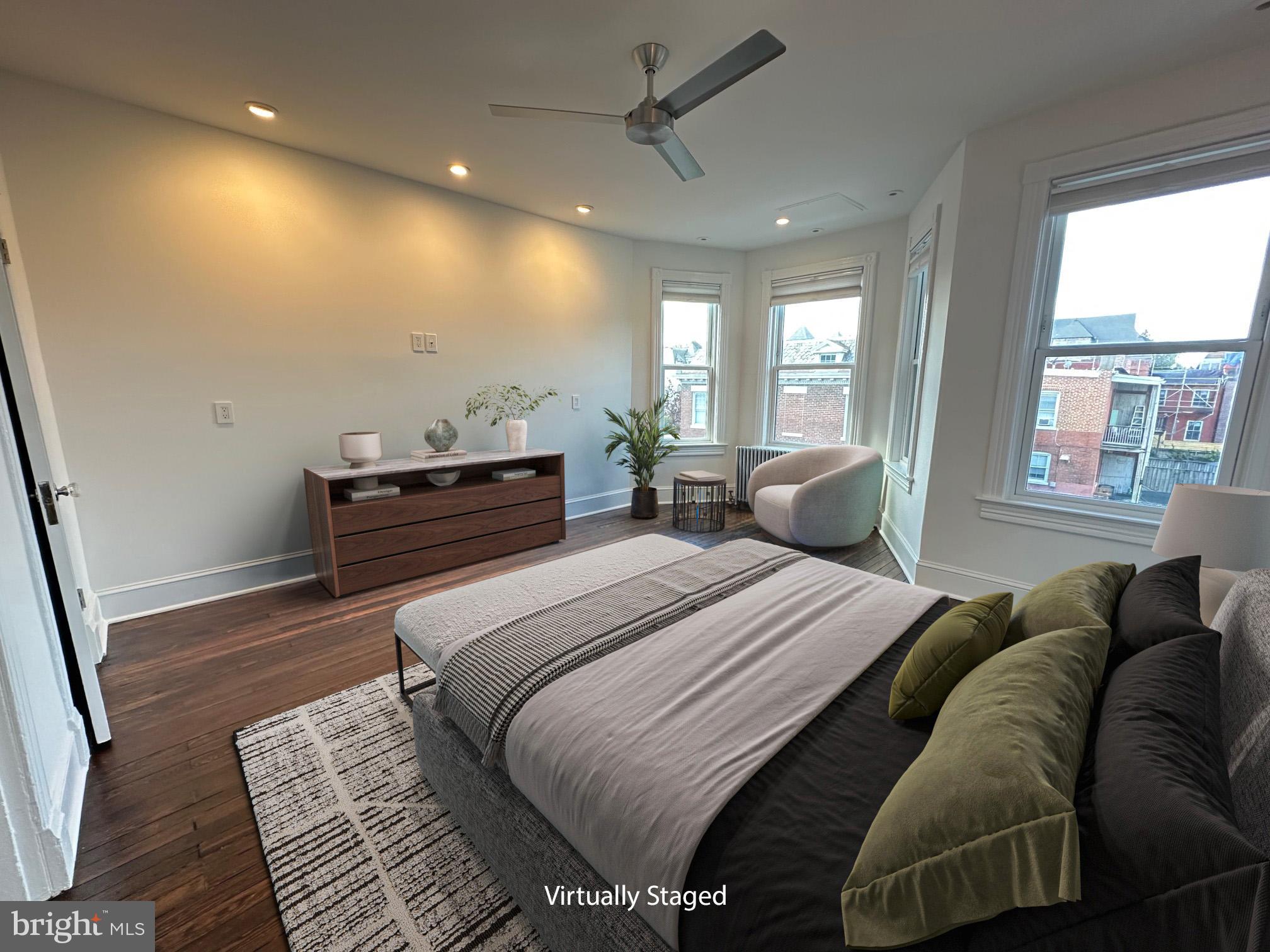 1903 4th Street Northwest Washington, DC 20001 - Photo 11 of 36 a bedroom with a bed and wooden floor