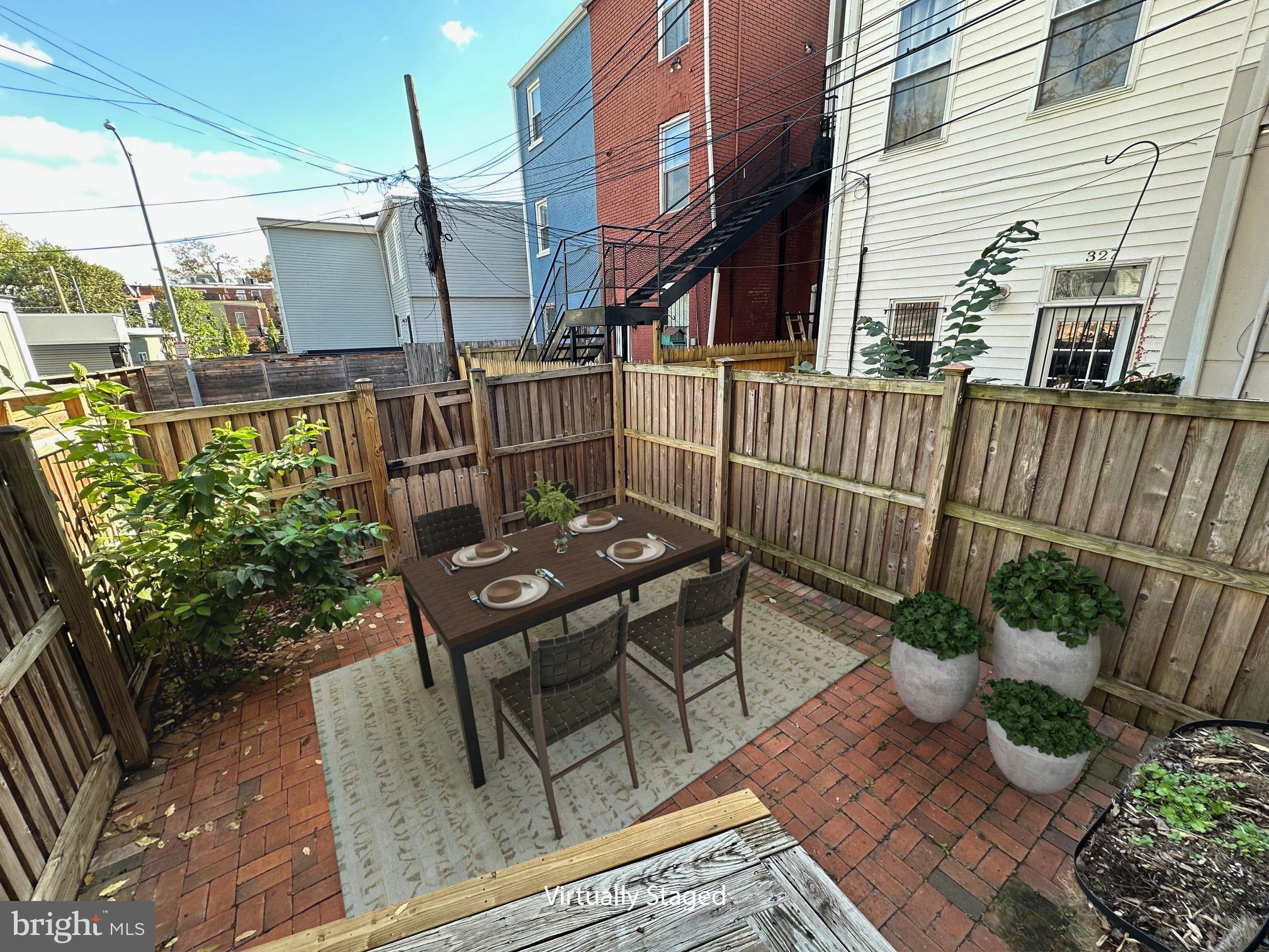 1903 4th Street Northwest Washington, DC 20001 - Photo 19 of 36 a view of a patio with iron fence