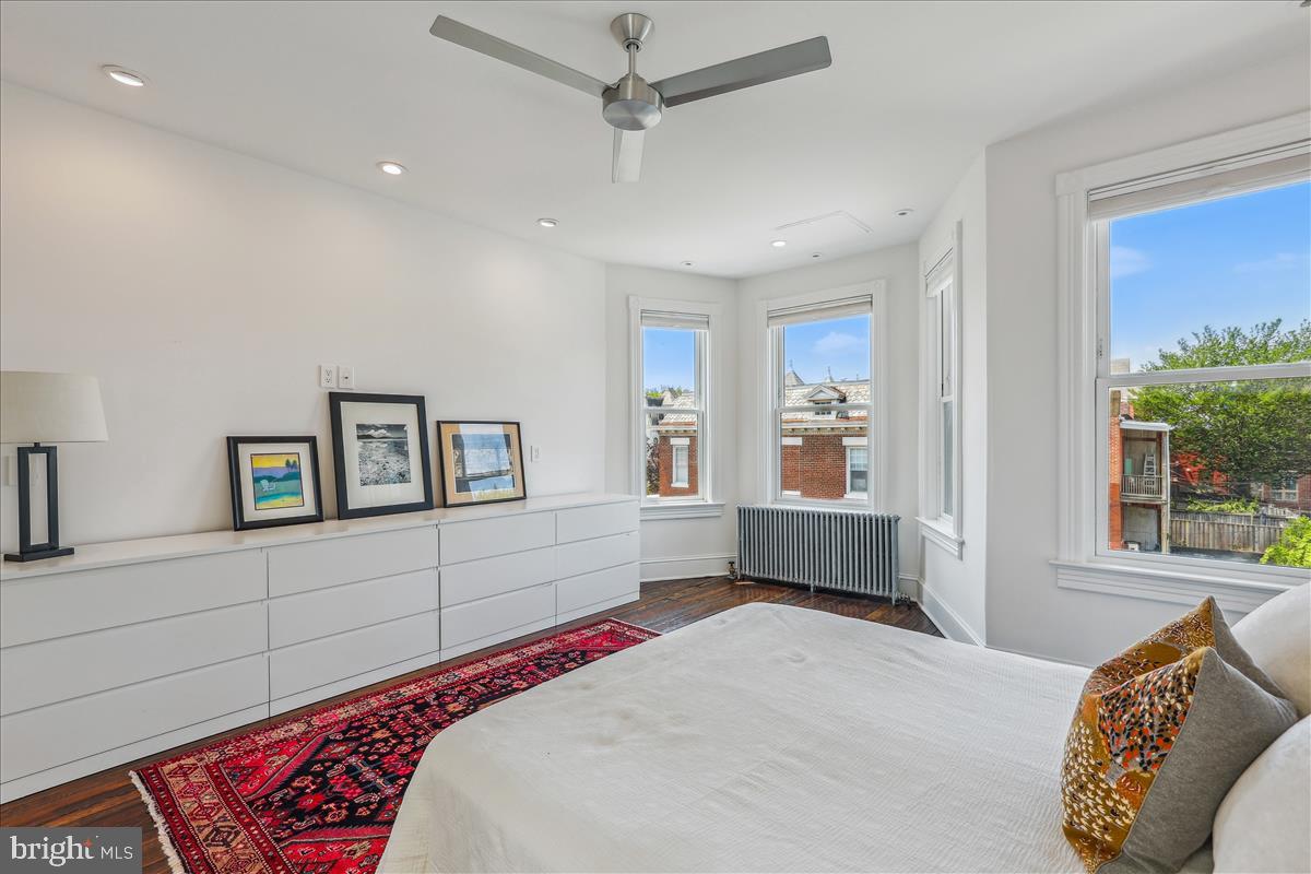 1903 4th Street Northwest Washington, DC 20001 - Photo 29 of 36 a bedroom with a large bed and a window
