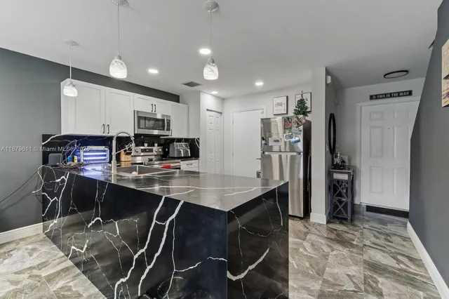 $399,999 | 8532 West Southgate Shores Circle, Tamarac, FL 33321