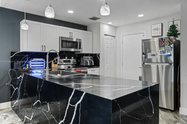 $399,999 | 8532 West Southgate Shores Circle, Tamarac, FL 33321