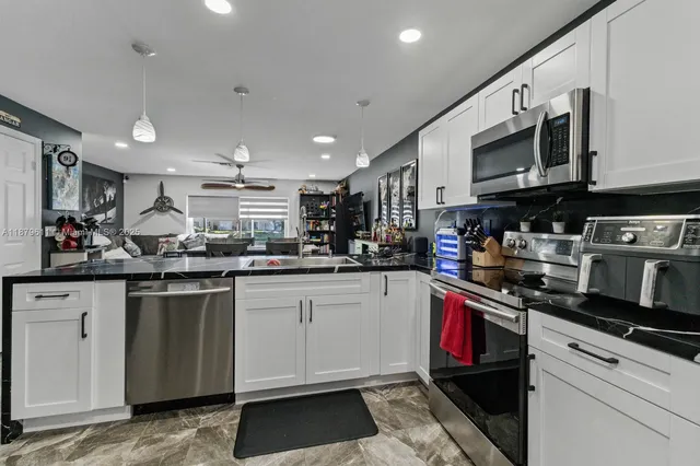 $399,999 | 8532 West Southgate Shores Circle, Tamarac, FL 33321