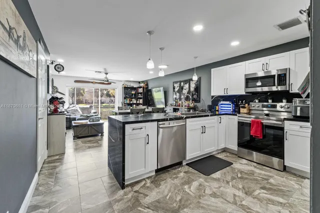 $399,999 | 8532 West Southgate Shores Circle, Tamarac, FL 33321