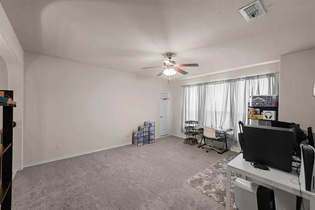a bathroom with a bathtub and a sink