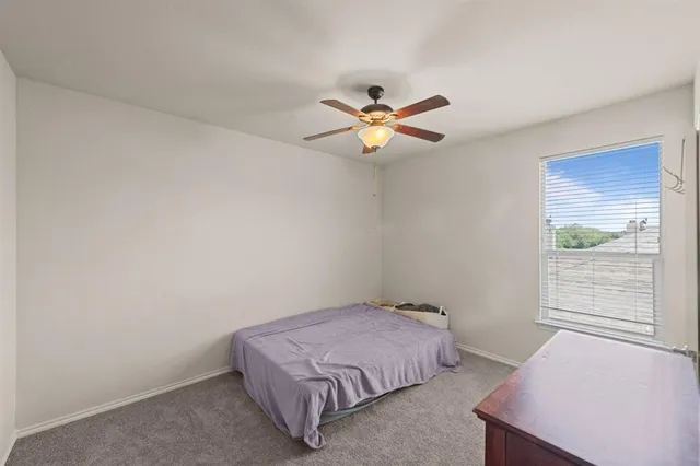a bathroom with a tub a sink and a shower