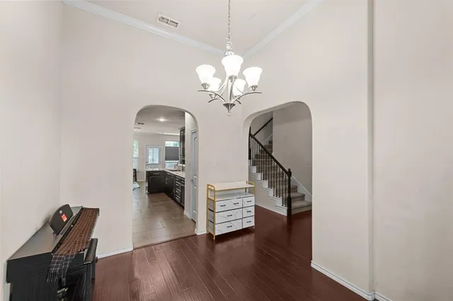 a view of a livingroom with wooden floor