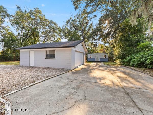1330 Eddy Road Jacksonville, FL 32211 - Photo 12 of 39 a view of garage and yard