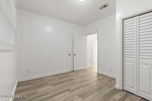 1330 Eddy Road Jacksonville, FL 32211 - Photo 23 of 39 wooden floor in an empty room