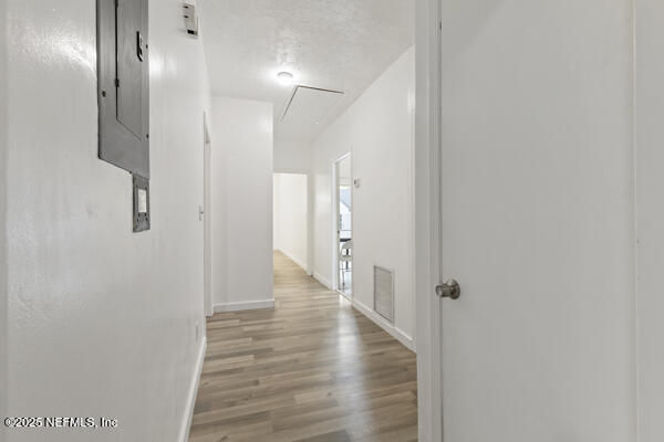 1330 Eddy Road Jacksonville, FL 32211 - Photo 24 of 39 a view of a hallway with wooden floor