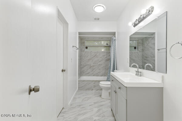 1330 Eddy Road Jacksonville, FL 32211 - Photo 25 of 39 a bathroom with a sink a toilet and shower