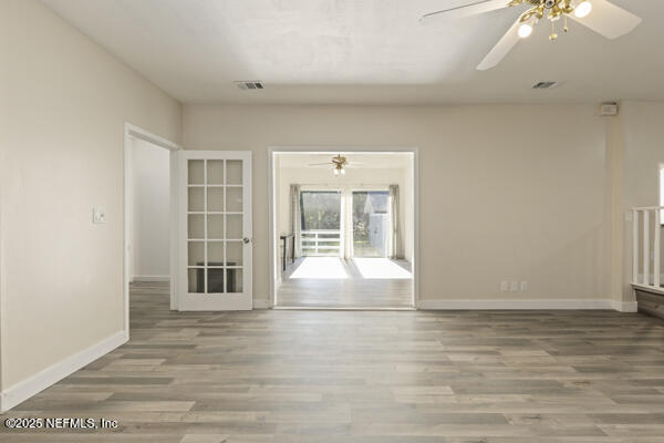 1330 Eddy Road Jacksonville, FL 32211 - Photo 38 of 39 wooden floor in an empty room with a window