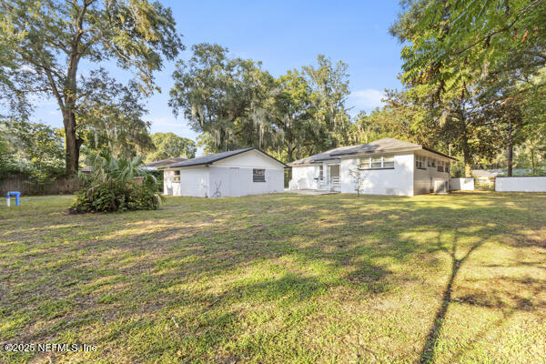 1330 Eddy Road Jacksonville, FL 32211 - Photo 7 of 39 a house view with swimming pool in front of it