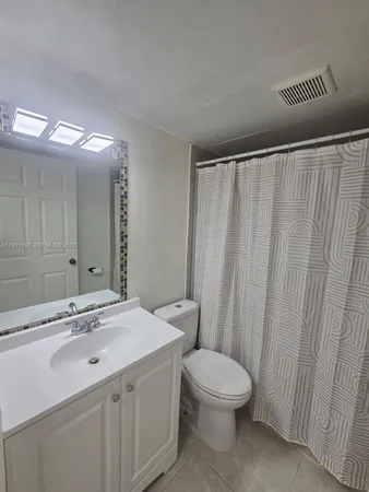 a view of room with walk in closet