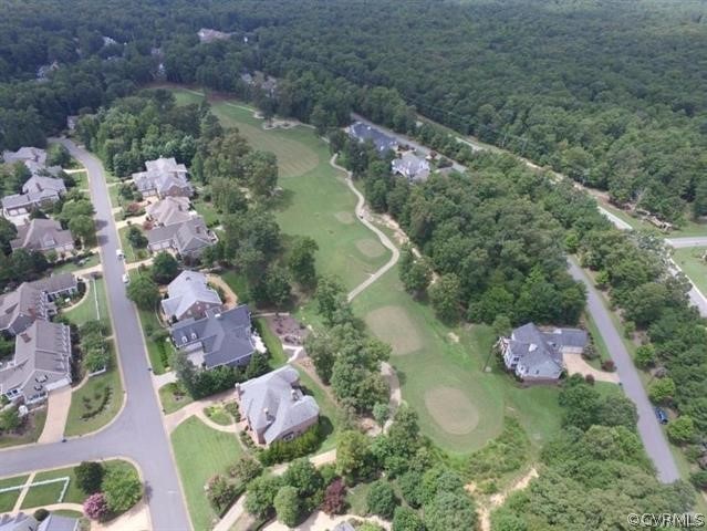an aerial view of residential house with outdoor space
