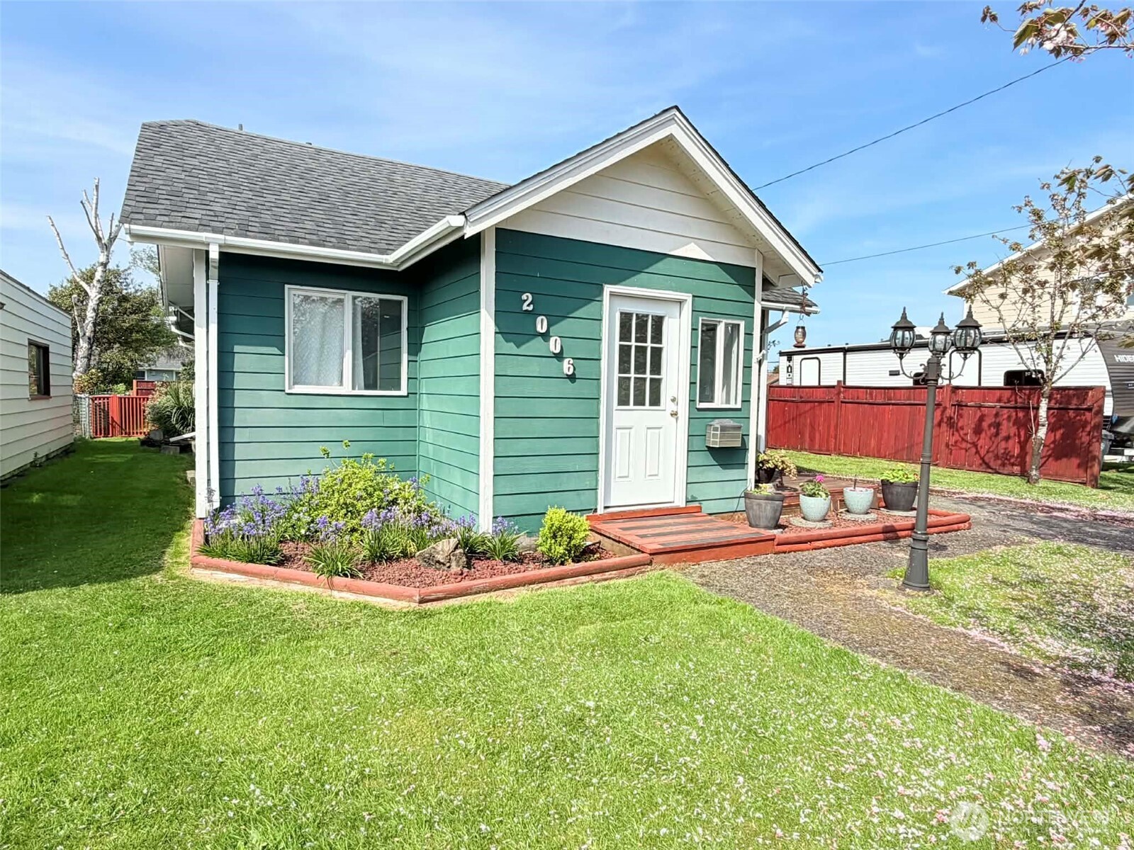 2006 West Second Street Aberdeen, WA 98520 - Photo 5 of 39 a front view of a house with a yard
