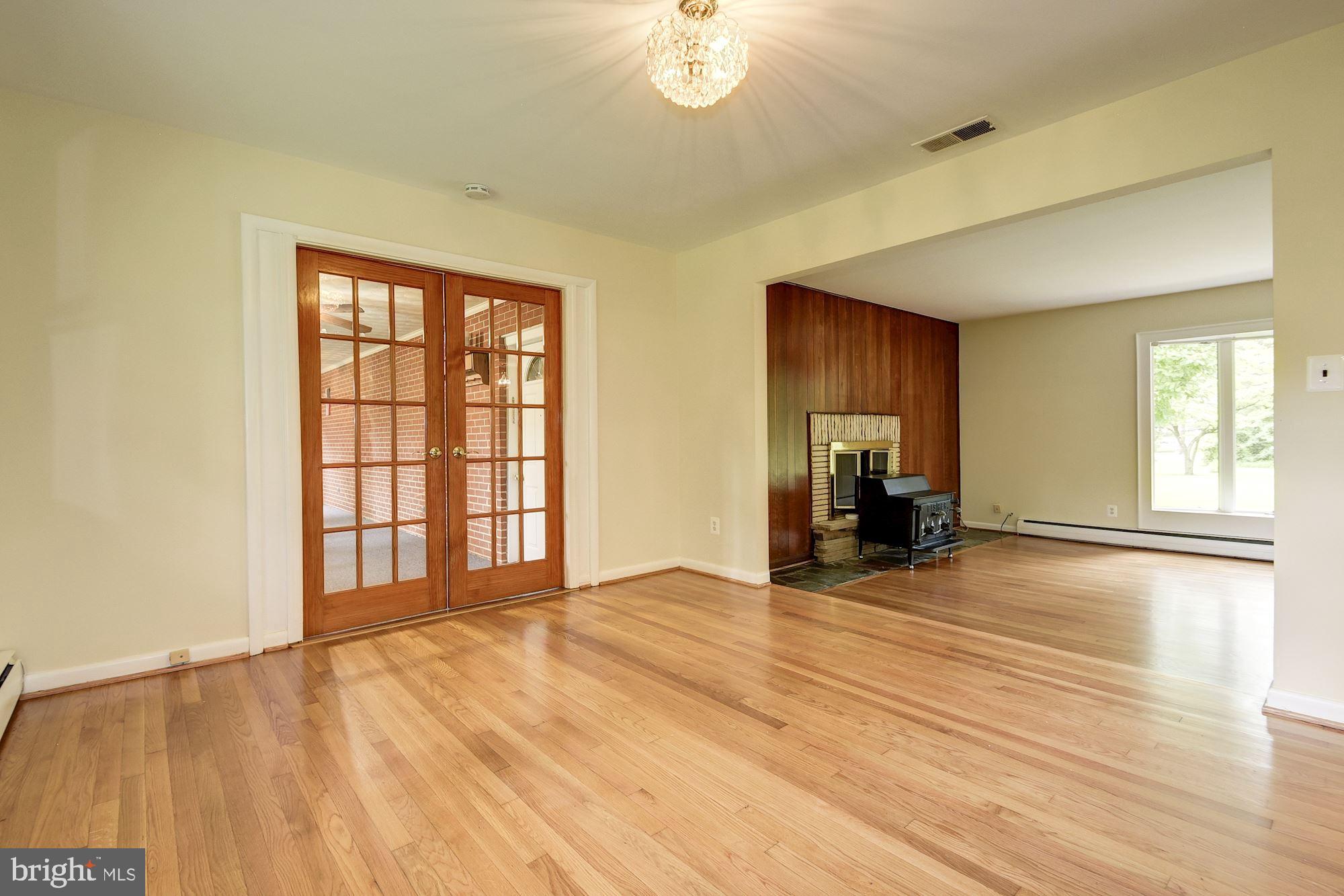 3304 Enterprise Road Bowie, MD 20721 - Photo 14 of 35 Refinished Wood Floors in Living and Dining Rooms